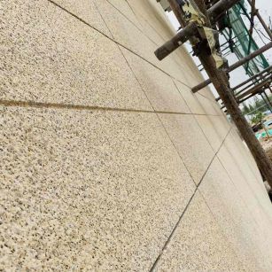 咸宁 黄金麻花岗岩荔枝面外墙干挂石材效果示例