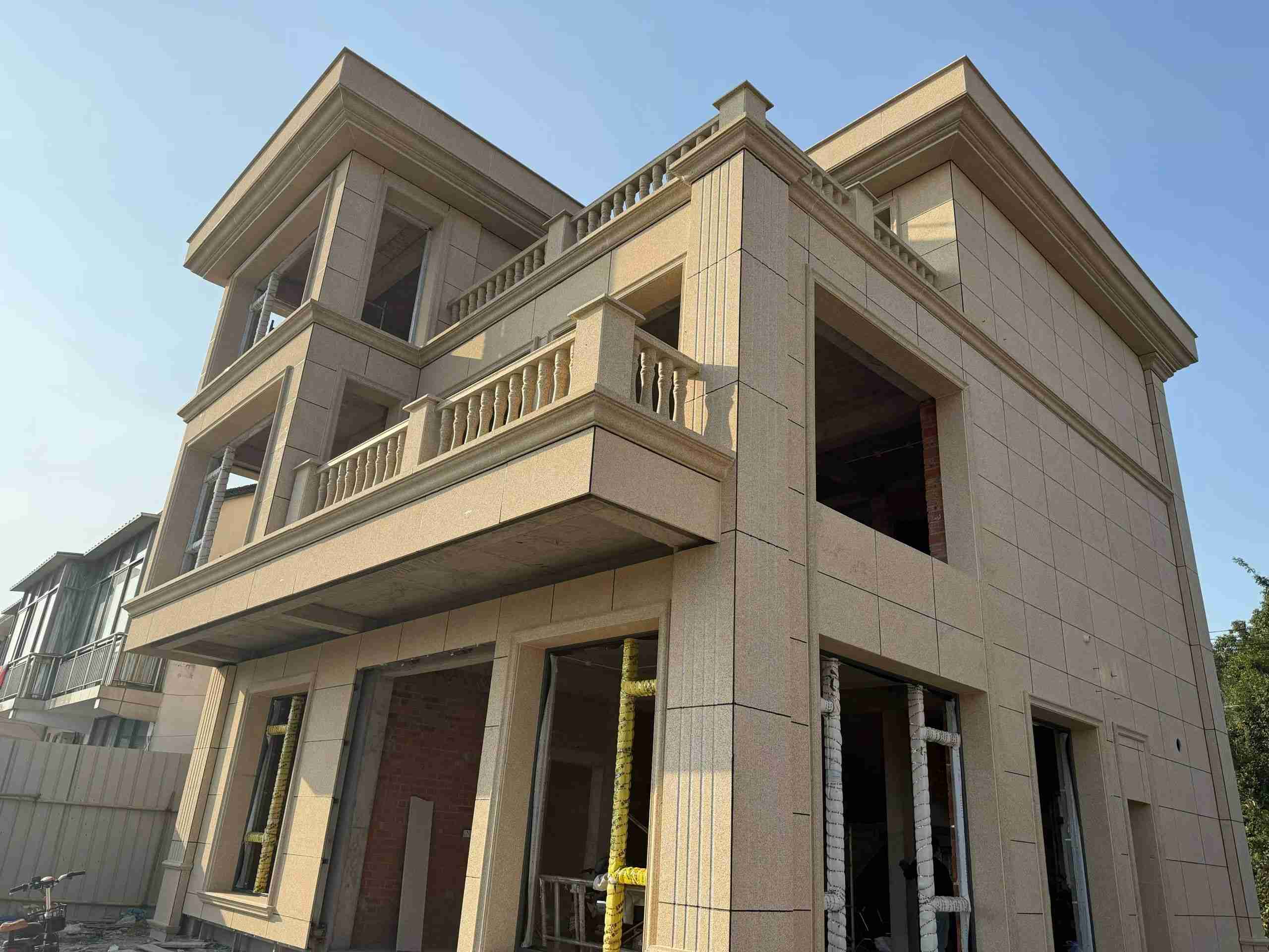 咸宁 黄金麻花岗岩石材荔枝面外墙干挂效果展示