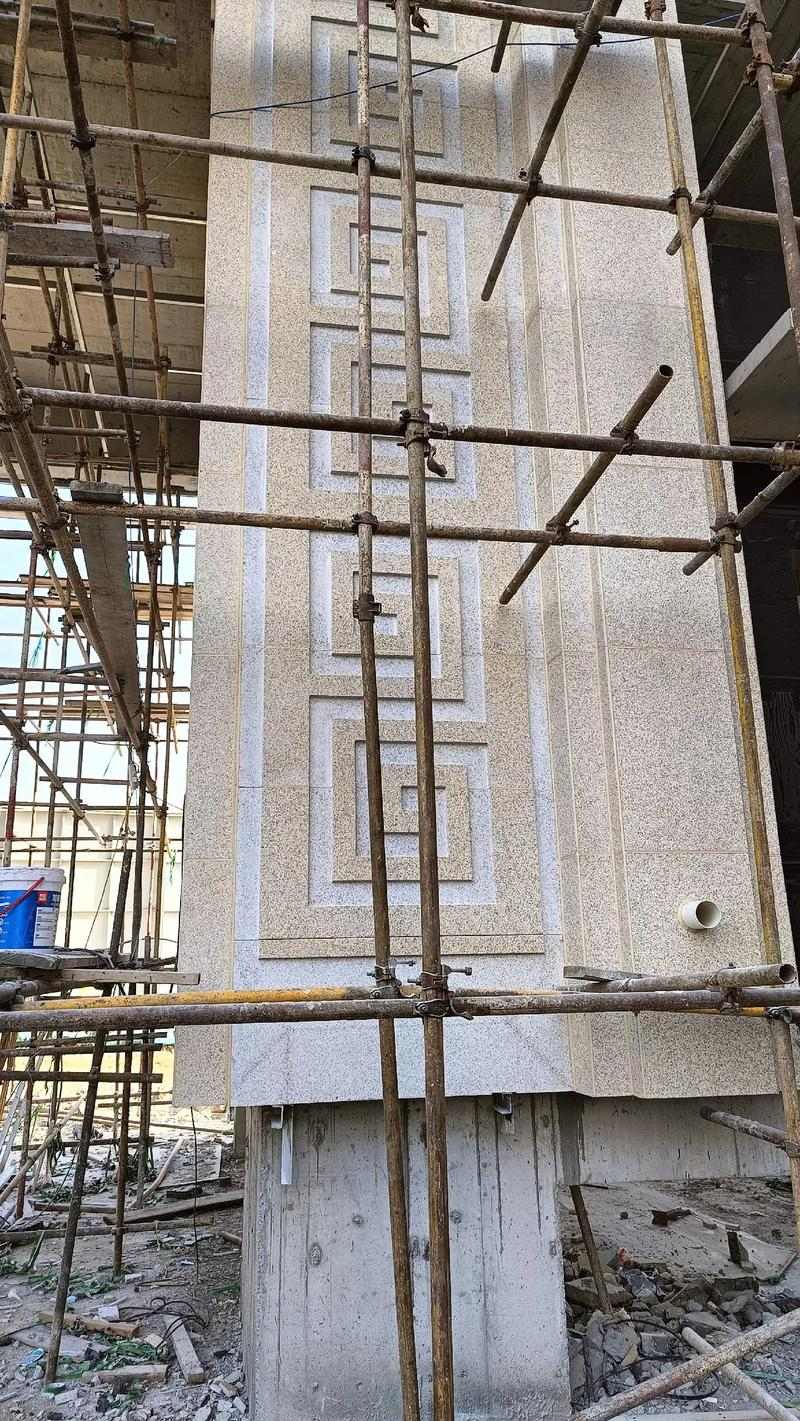 咸宁 黄金麻花岗岩别墅外墙干挂回纹造型效果